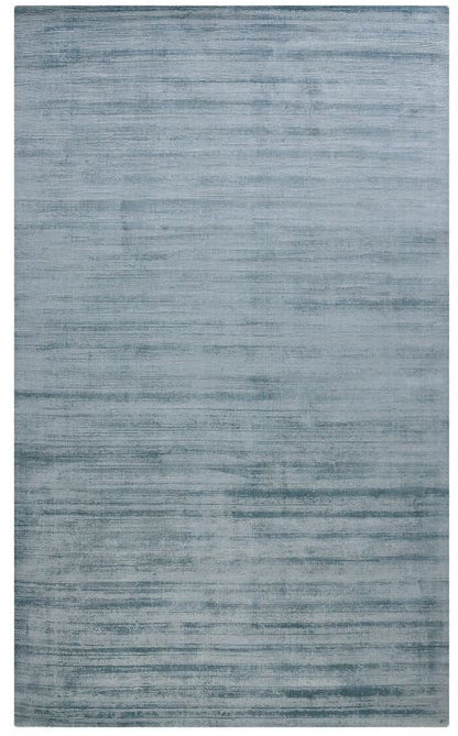 Rectangular blue rug on a white background