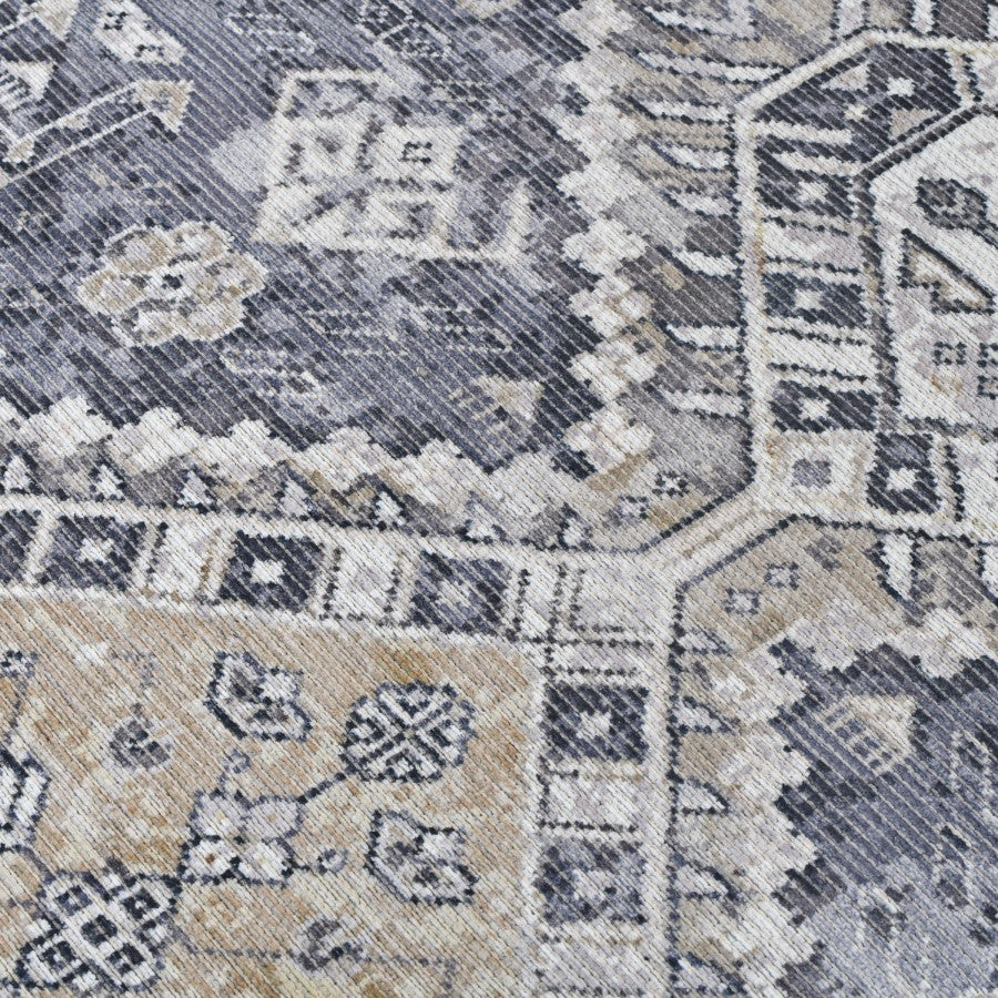 Close-up of a patterned rug with geometric design
