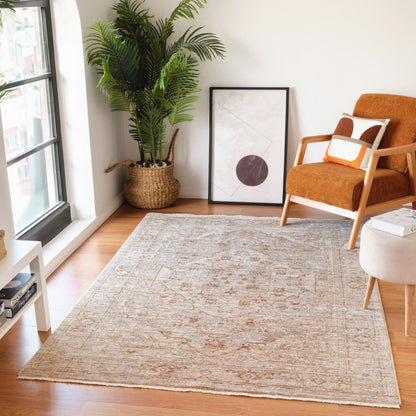 Living room with a beige rug, brown armchair, and a plant.