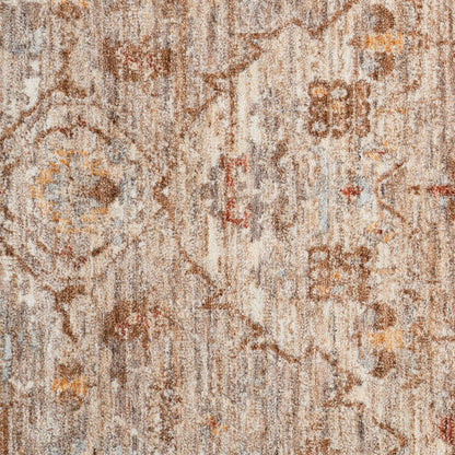 Close-up of a textured patterned rug with earthy tones.