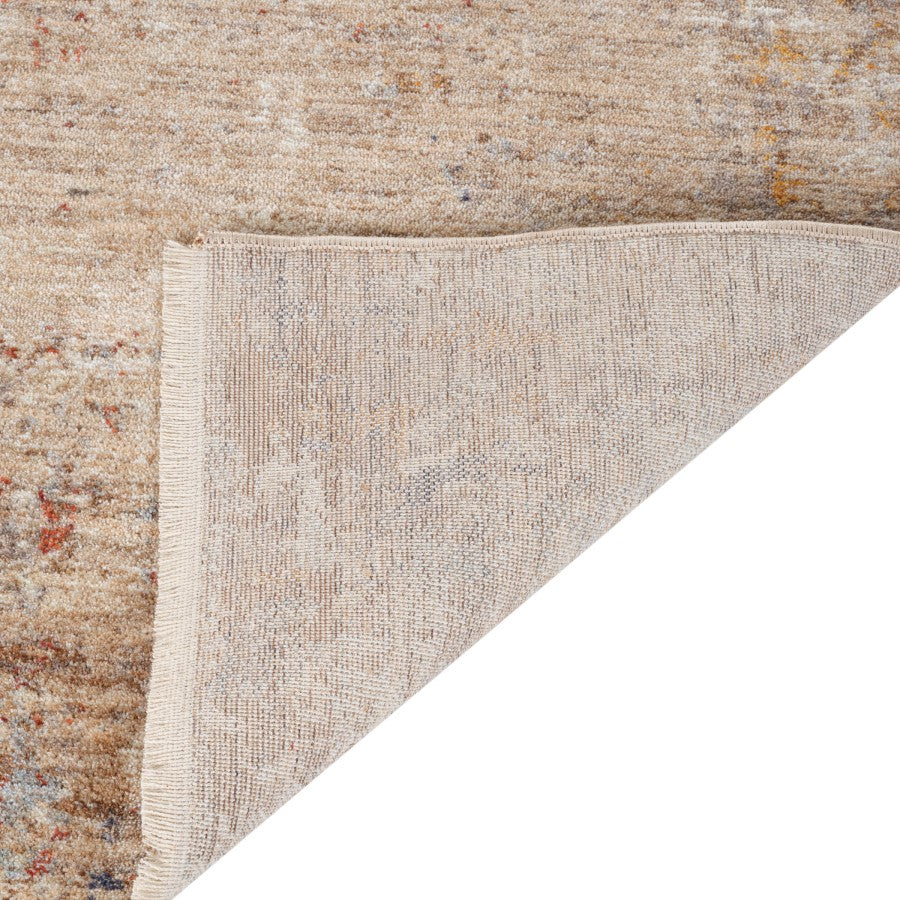 Close-up of a textured beige rug corner on a white background