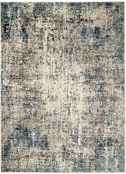 Abstract patterned rug with blue and beige colors on a white background