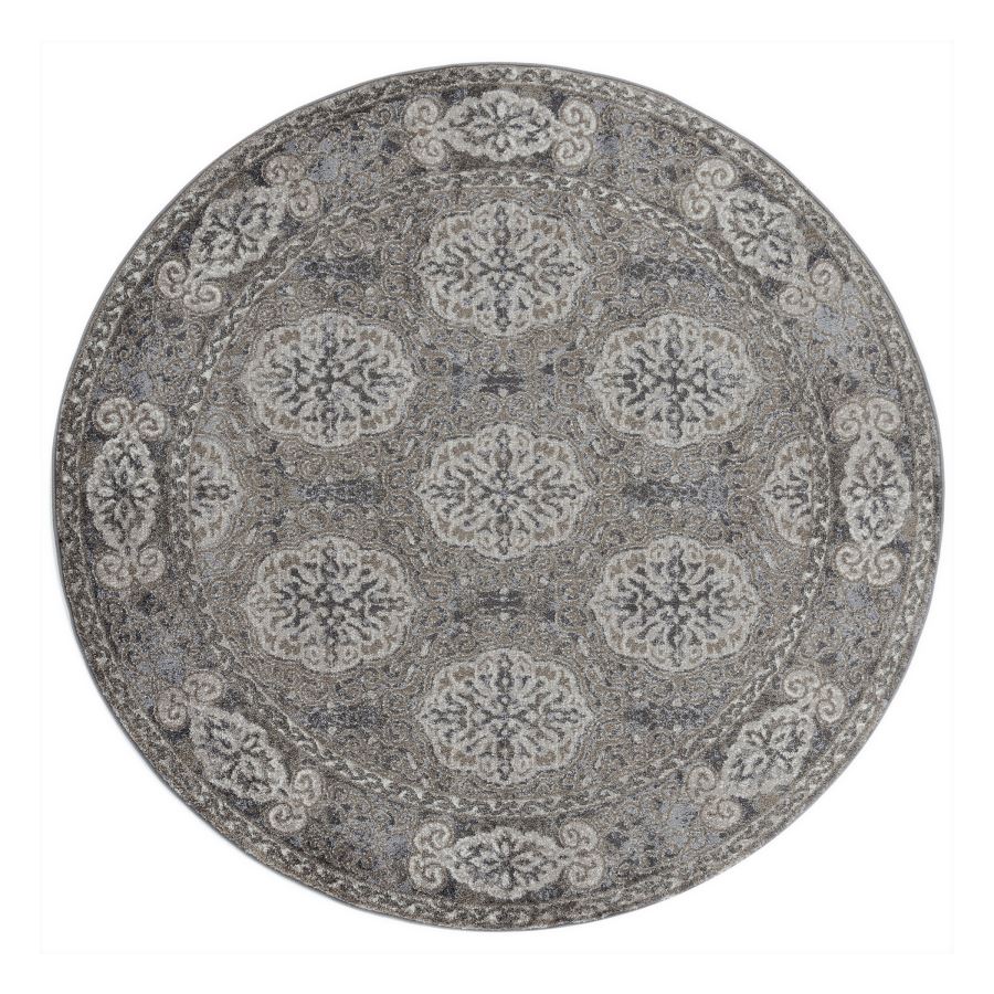 Round rug with a floral pattern on a white background