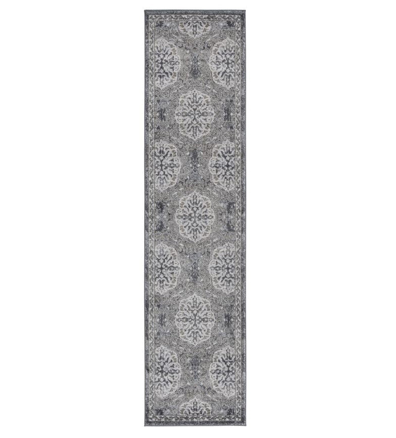 Long rectangular gray rug with a floral pattern on a white background