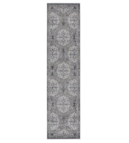 Long rectangular gray rug with a floral pattern on a white background