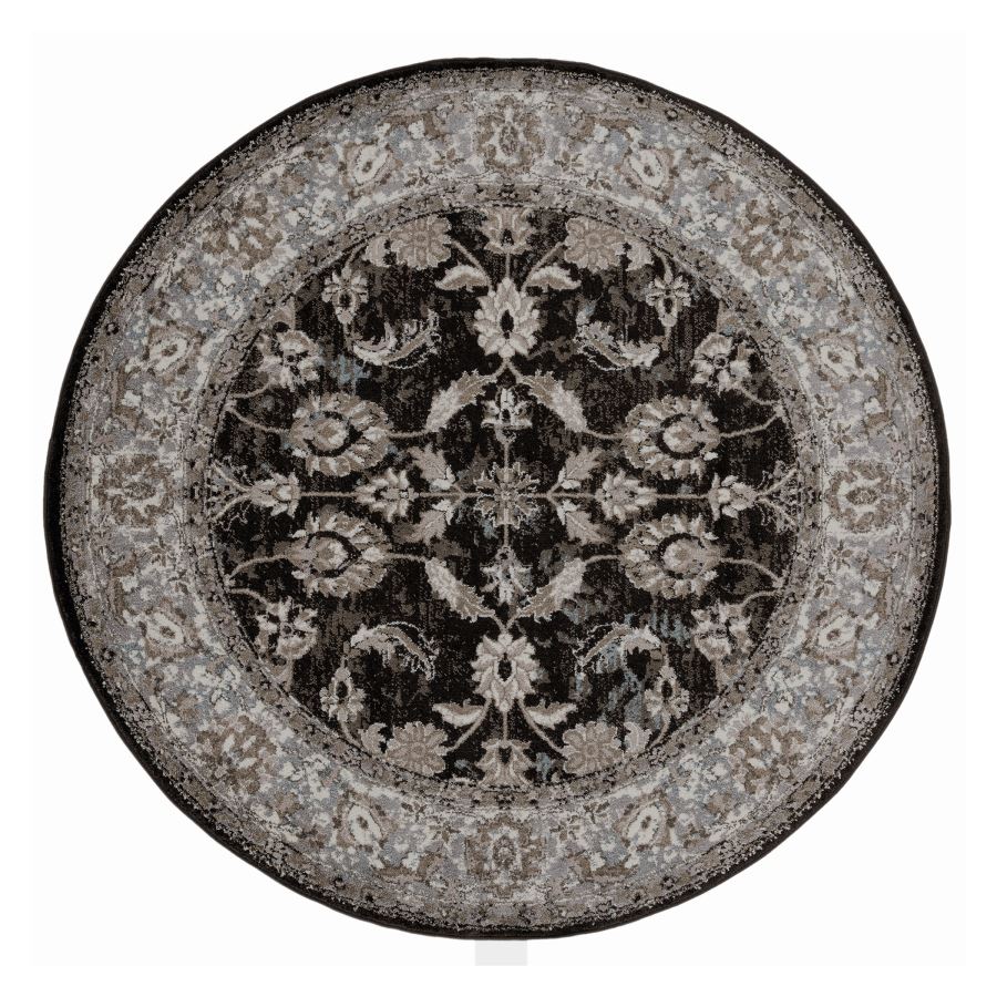 Round rug with intricate floral pattern on a white background