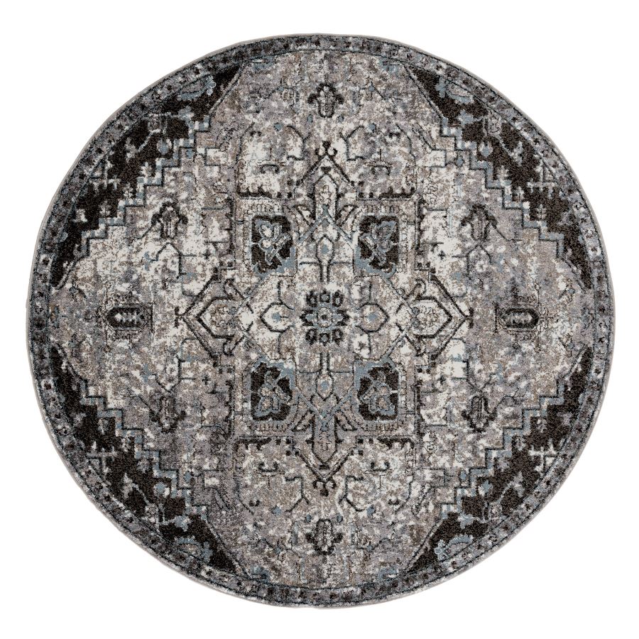 Round rug with a geometric pattern on a white background
