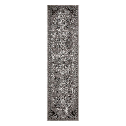 Long rectangular gray area rug with intricate patterns on a white background