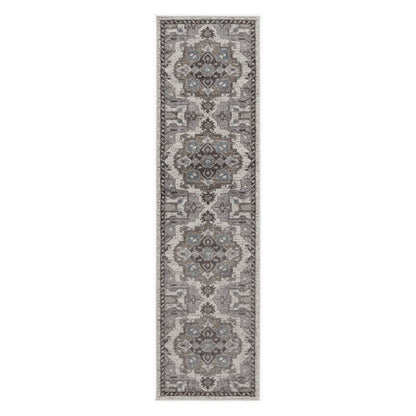 Long rectangular gray area rug with intricate patterns on a white background