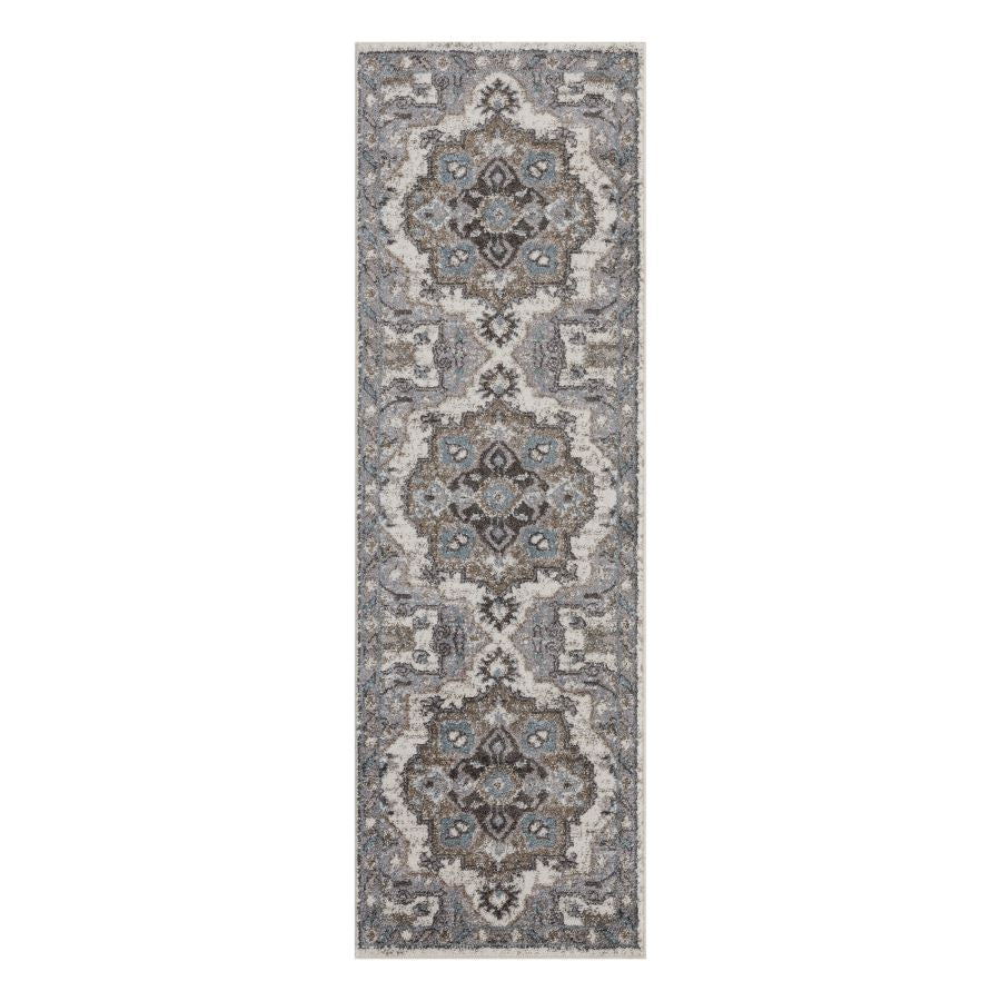 Decorative runner rug with intricate patterns on a white background