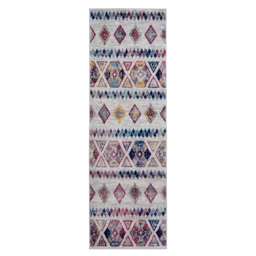 Patterned rug with geometric design on a white background