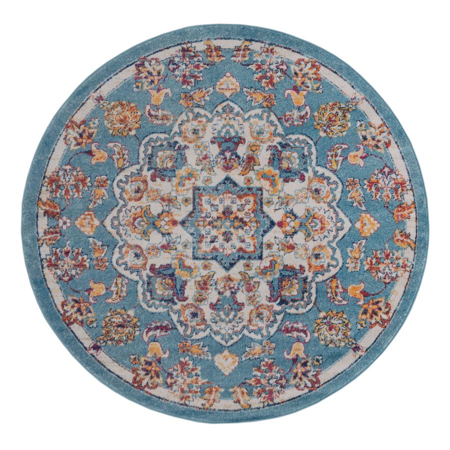 Round floral patterned rug with a blue background on a white background