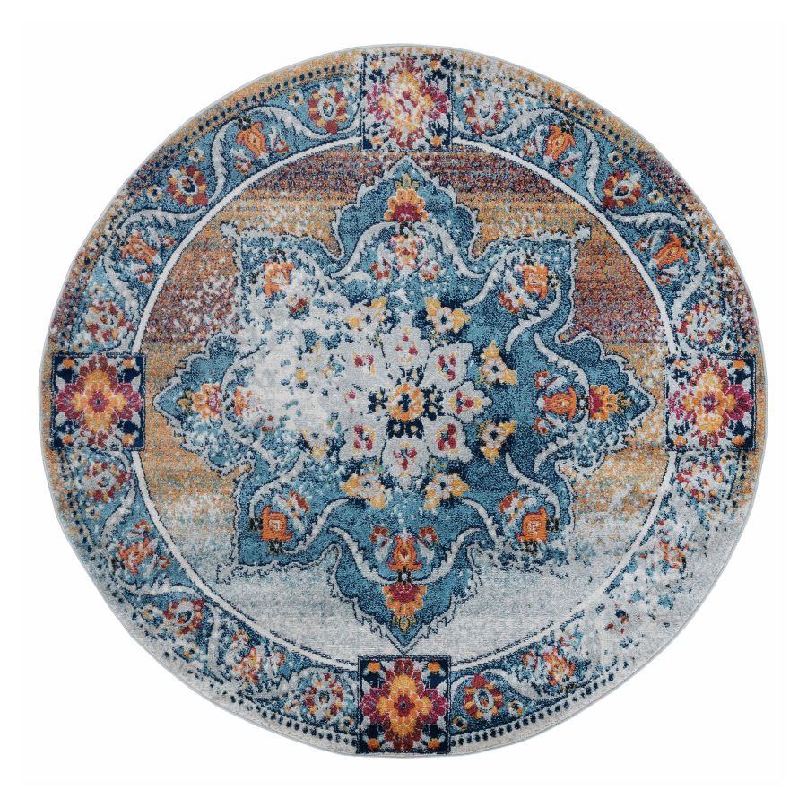 Round rug with intricate floral pattern on a white background