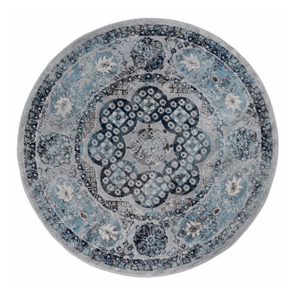 Round rug with a blue and gray pattern on a white background
