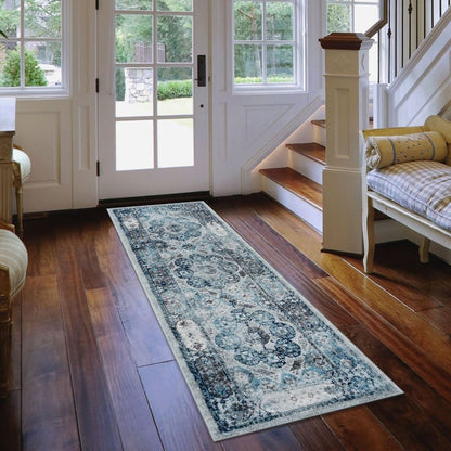 Long decorative rug on a wooden floor in a home setting with a staircase and doors.