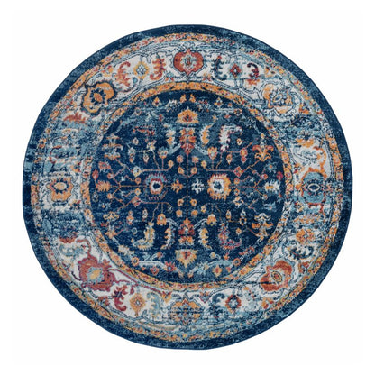 Round rug with intricate blue and orange pattern on a white background