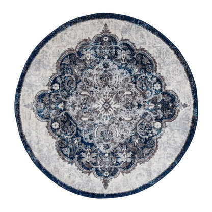 Round rug with intricate blue and gray pattern on a white background