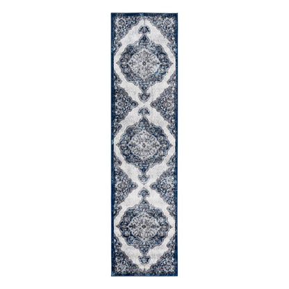 Navy blue and white patterned runner rug on a white background