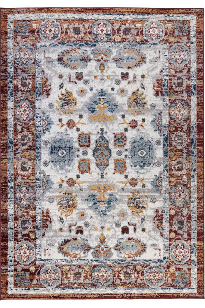 Decorative rug with intricate patterns on a white background