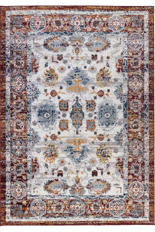 Decorative rug with intricate patterns on a white background