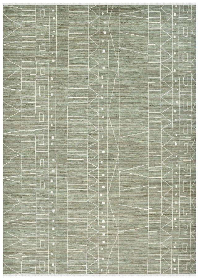 Green and white geometric patterned rug on a white background