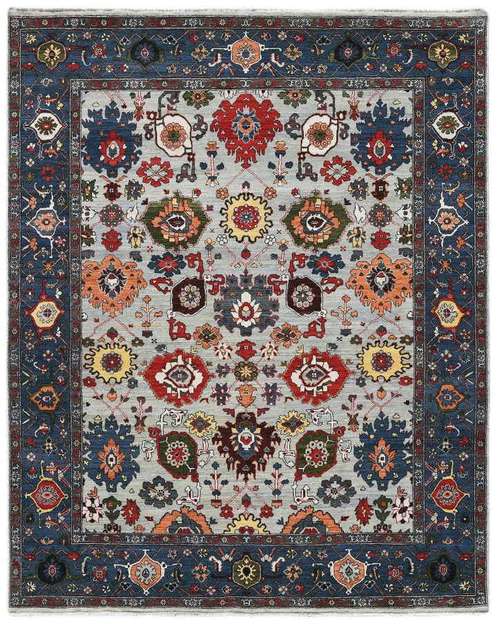 Decorative rug with intricate patterns on a white background