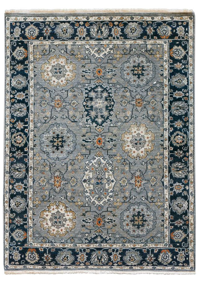 Decorative rug with intricate patterns on a white background