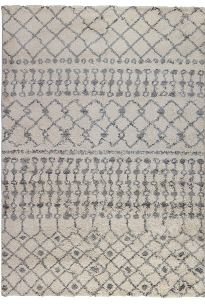 Patterned rug with geometric design on a white background