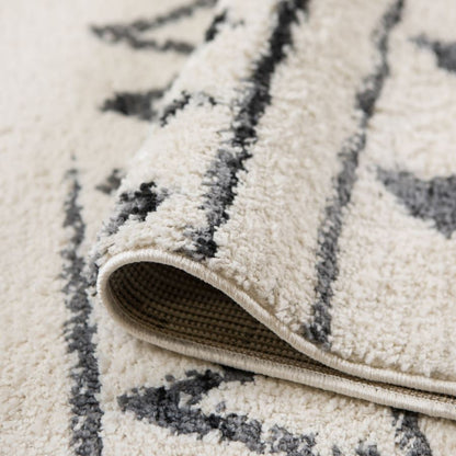 Close-up of a textured rug with geometric pattern