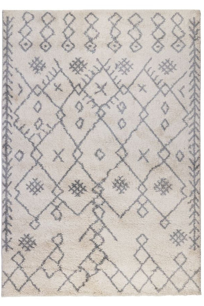 Beige rug with geometric pattern on a white background