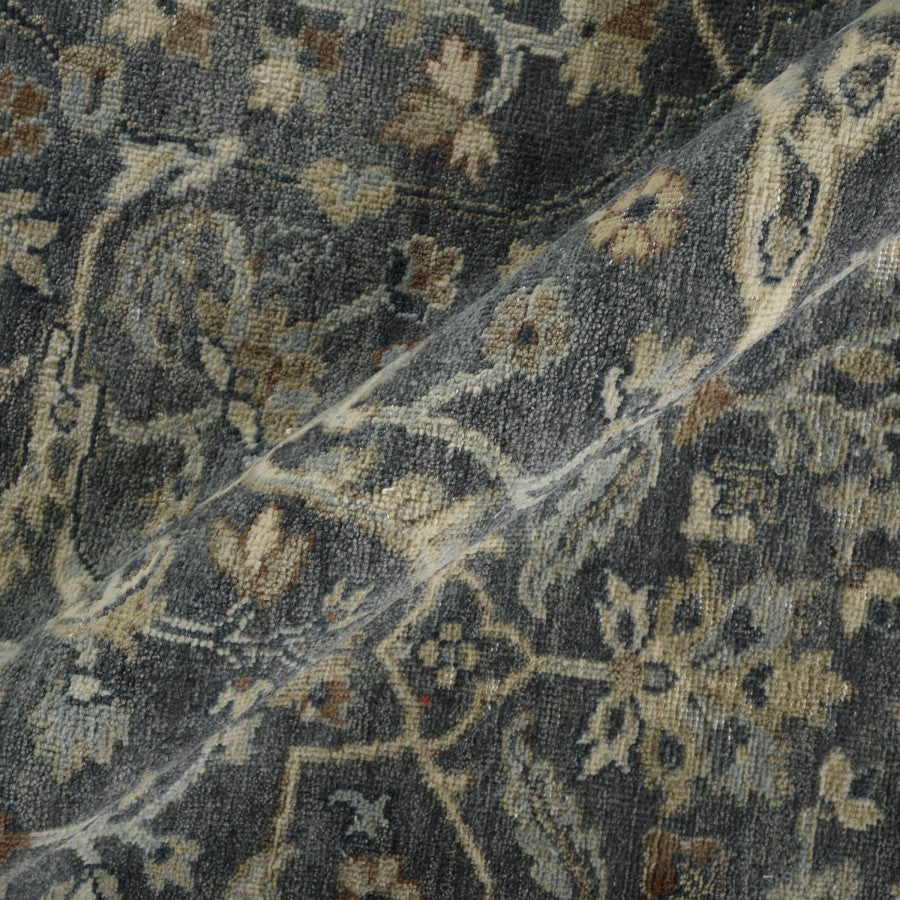 Close-up of a patterned rug with intricate designs.