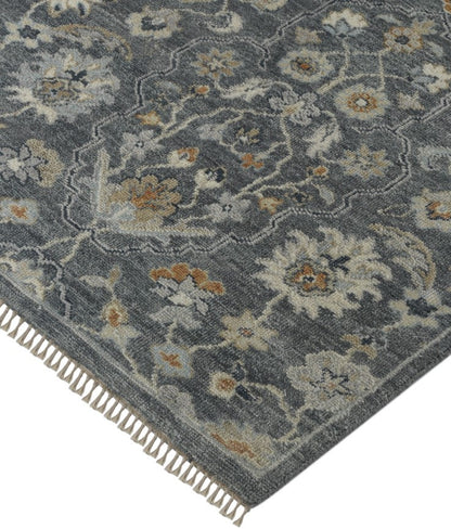 Floral patterned rug with a gray background