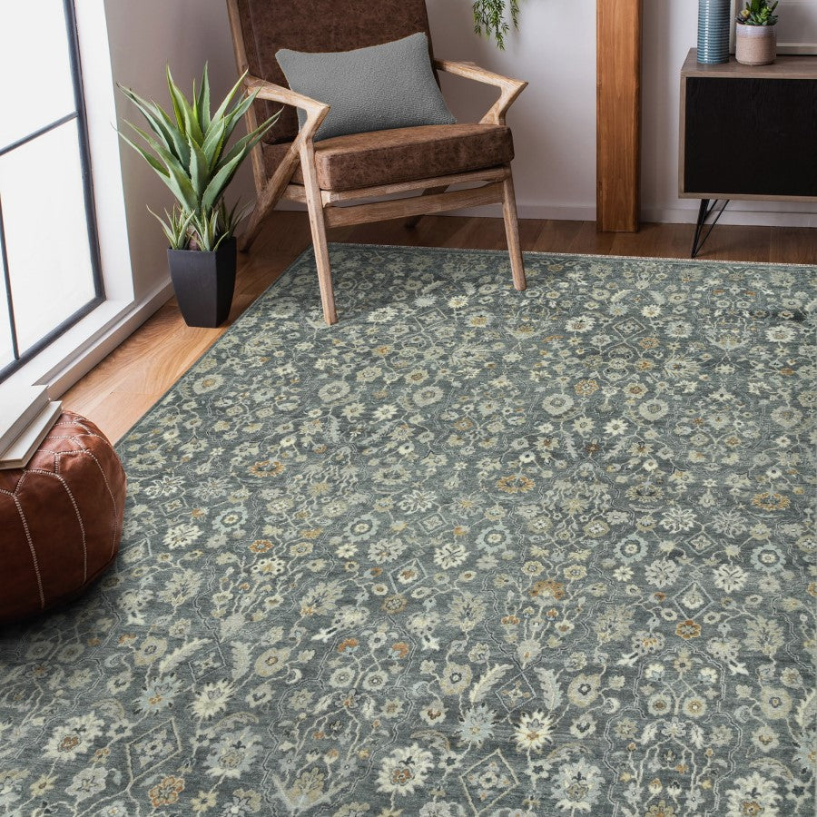 Floral patterned rug in a room with a chair and plants