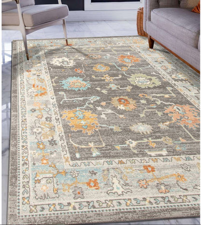 Decorative area rug with floral patterns in a living room setting