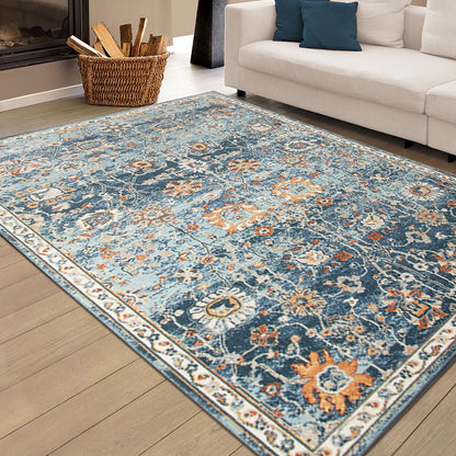 Decorative rug with blue and orange pattern in a living room setting.