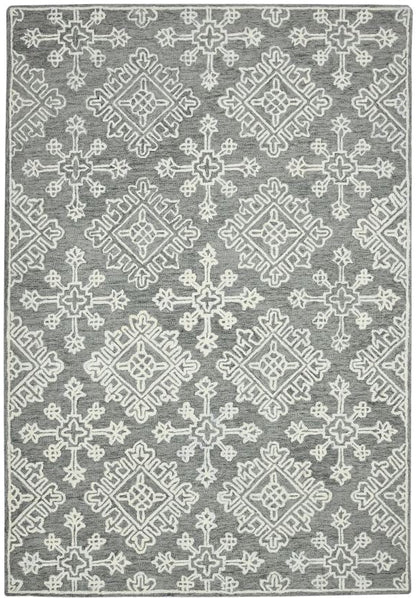 Gray area rug with white geometric pattern on a white background