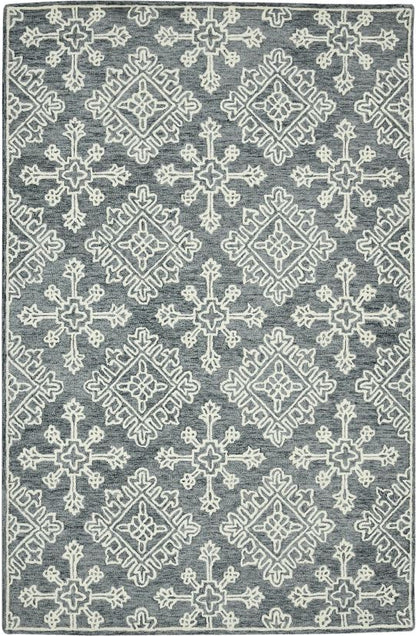 Gray area rug with white geometric pattern on a white background