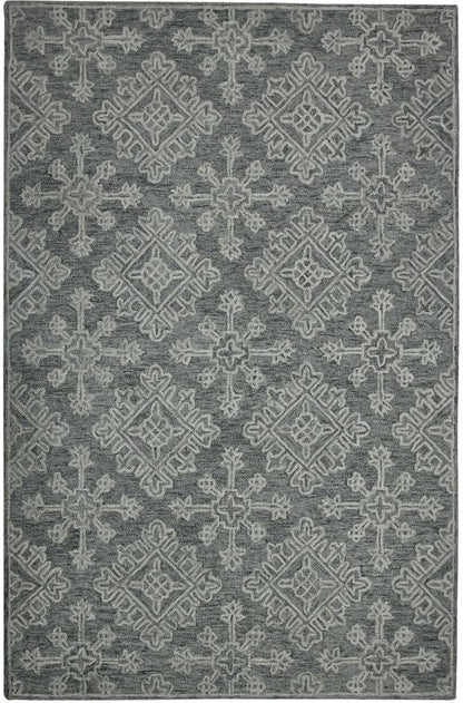 Gray area rug with geometric pattern on a white background