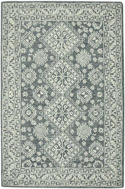 Gray and white patterned rug on a white background
