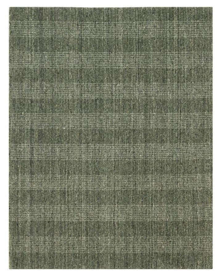 Textured green rug on a white background