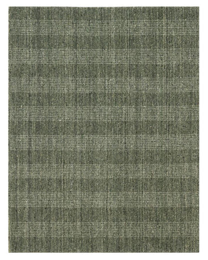 Textured green rug on a white background