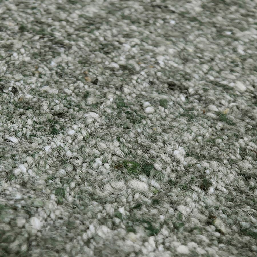 Close-up of a textured green and white surface