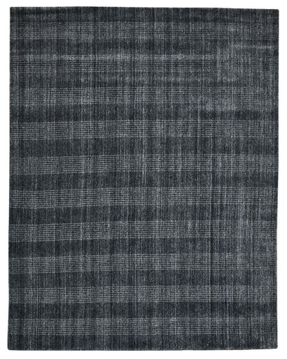 Dark gray checkered rug on a white background