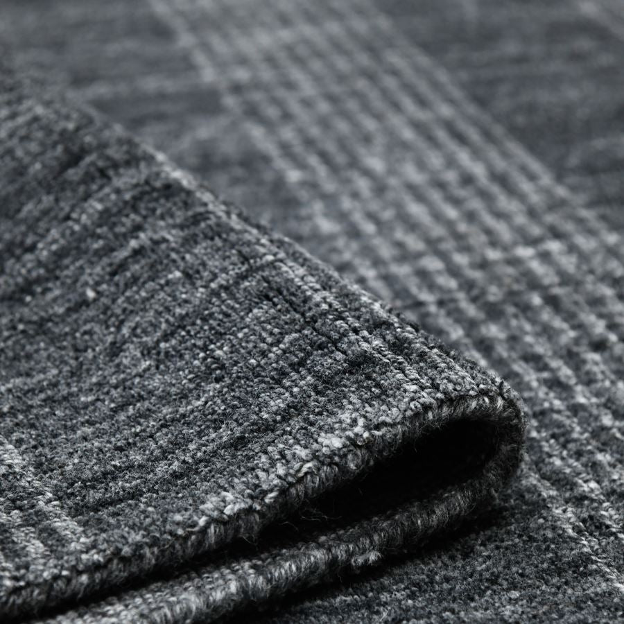 Close-up of textured gray carpet