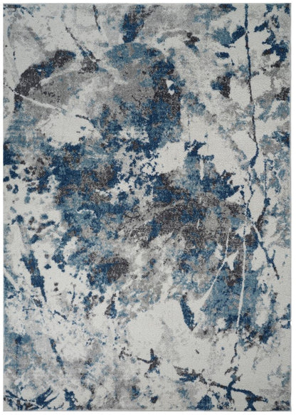 Abstract patterned rug with blue and gray colors on a white background