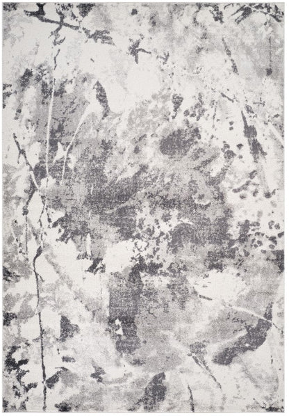 Abstract patterned rug with gray and white colors on a plain background