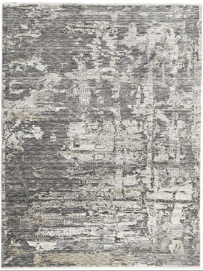 Gray and white patterned area rug on a white background