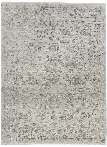 Gray patterned rug on a white background
