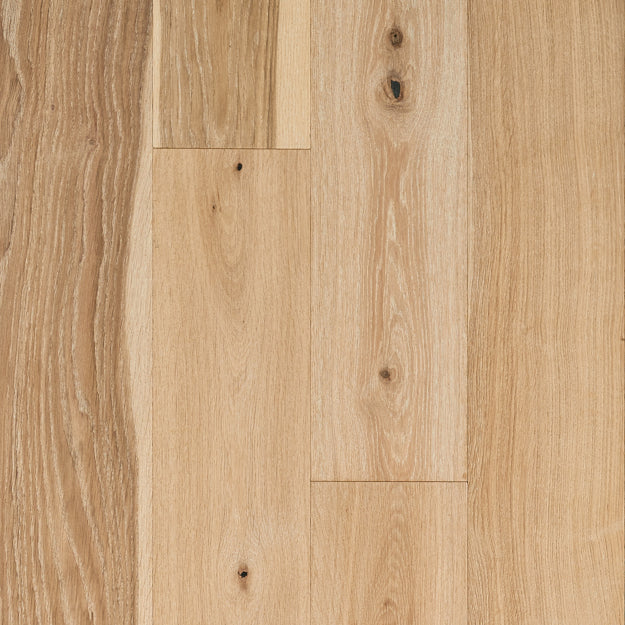 Close-up of light wood flooring with natural grain and texture