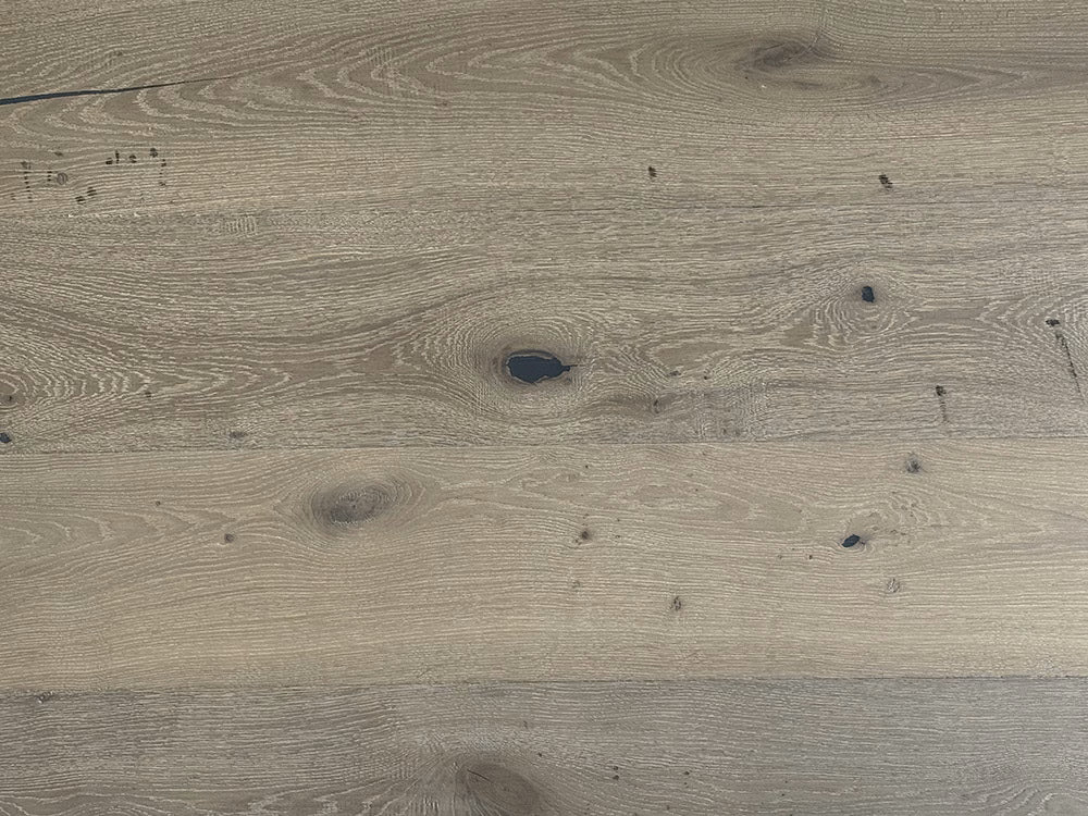 Close-up of a wooden surface with visible grain and texture